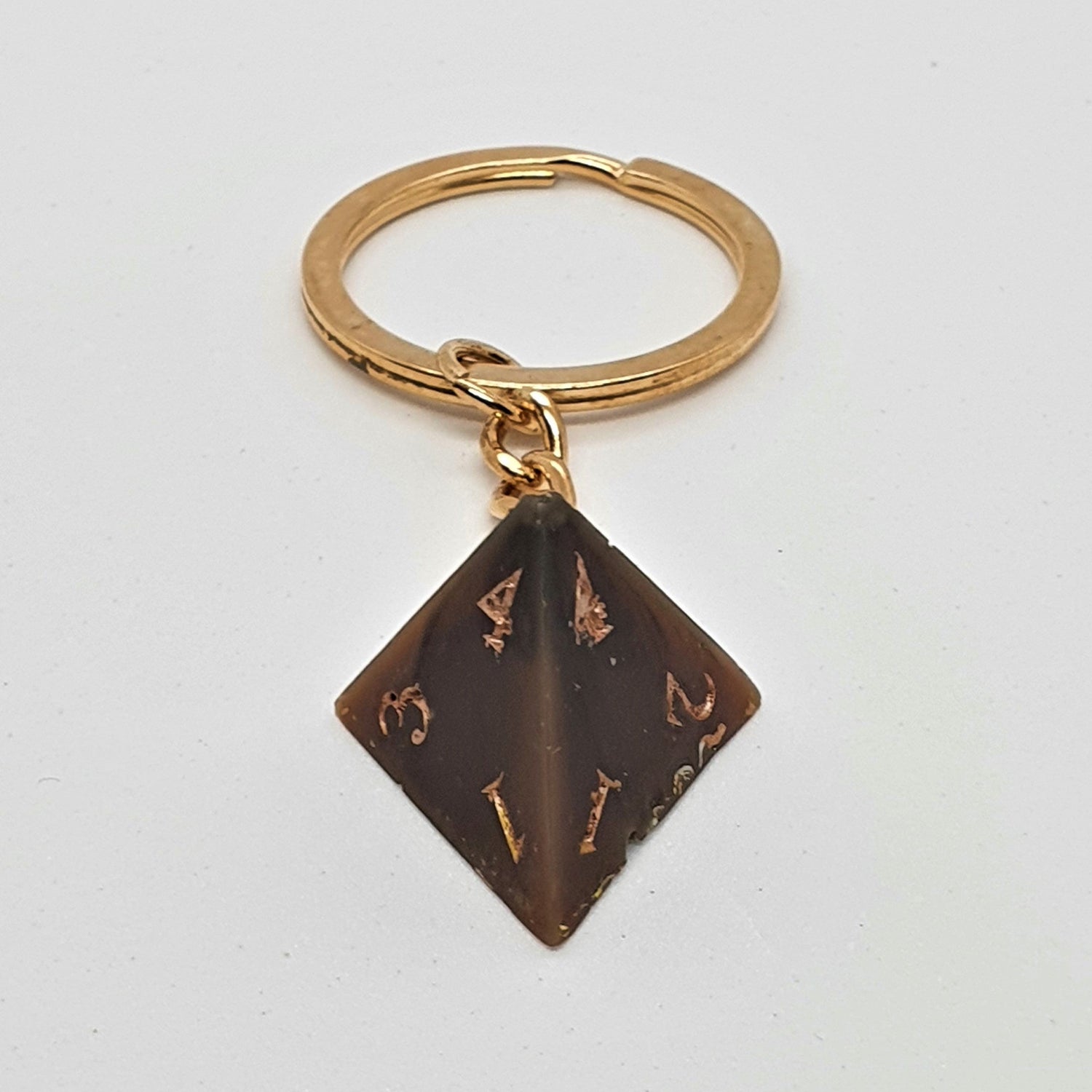 Porte-clés D4 marron et cuivre - Le Chat Pipé