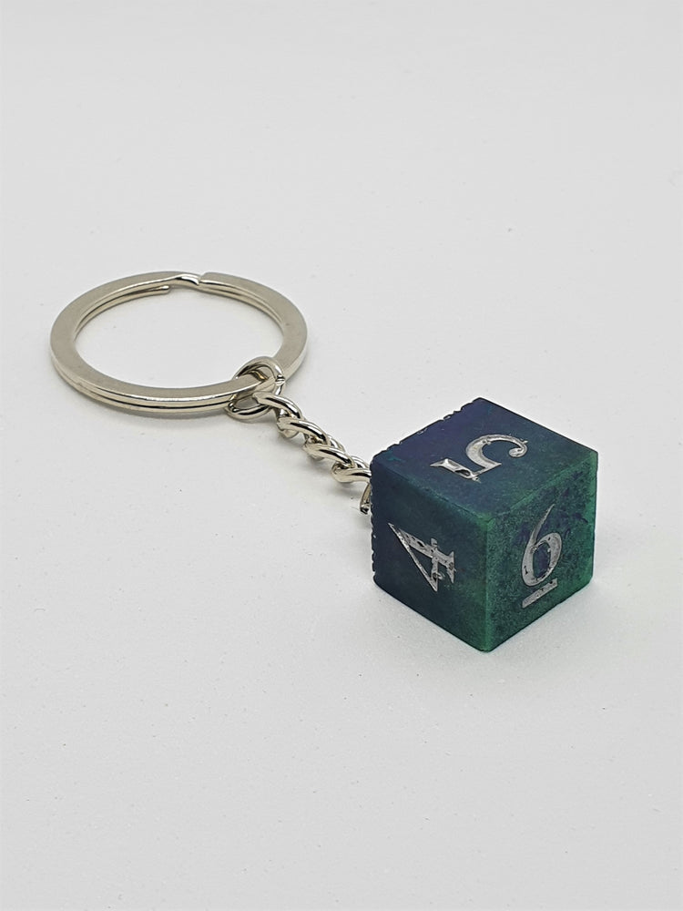 Porte-clés D6 vert et bleu - Le Chat Pipé