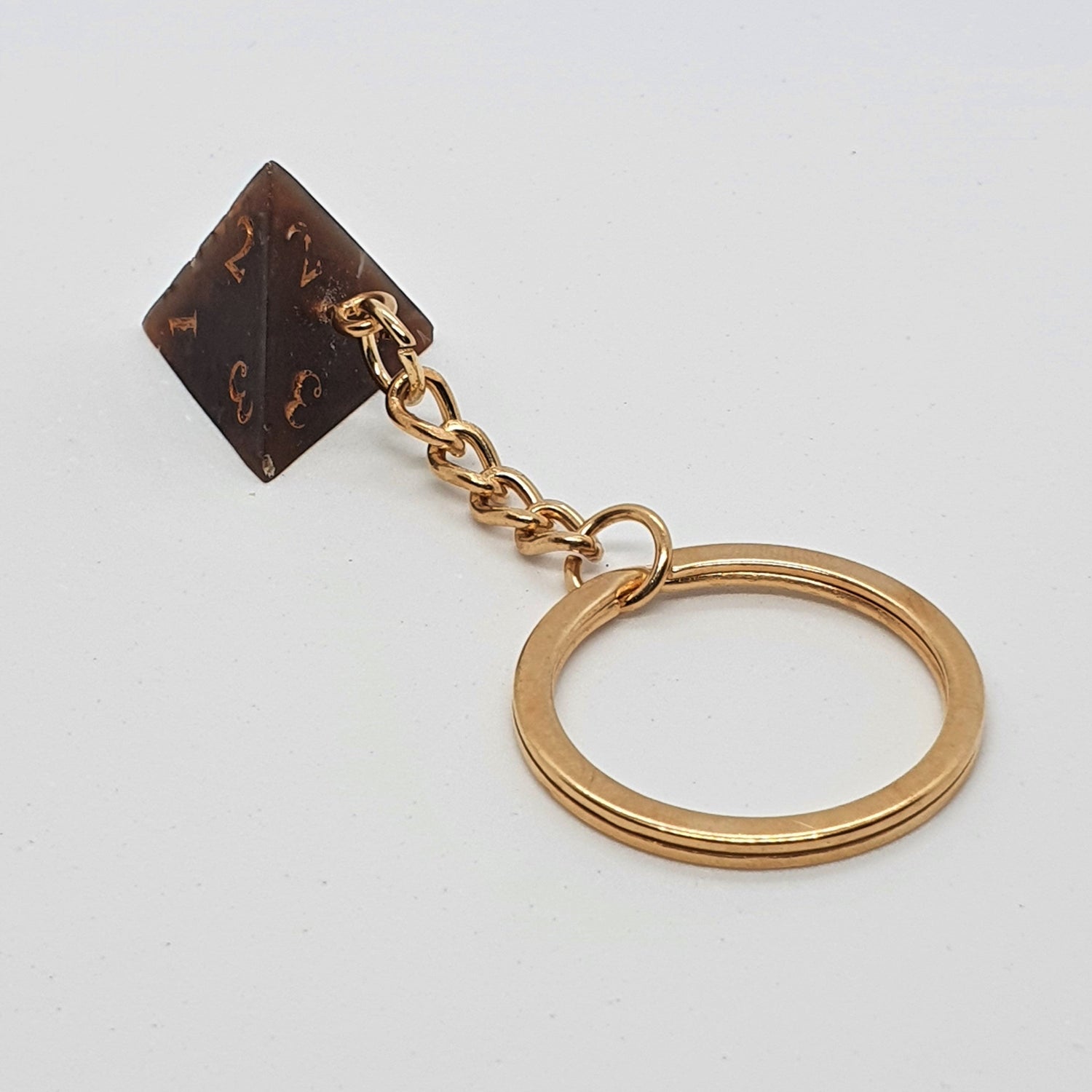 Porte-clés D4 marron et cuivre - Le Chat Pipé